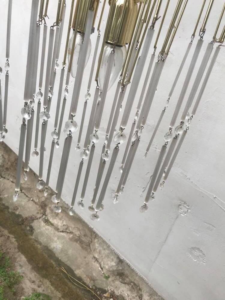 Vintage yellow chandelier in brass and Murano glass, 1970s, cascade style.