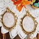 2 frames in gilded metal and curved glass