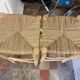 Lot de 2 tabourets en bois – assise paillée