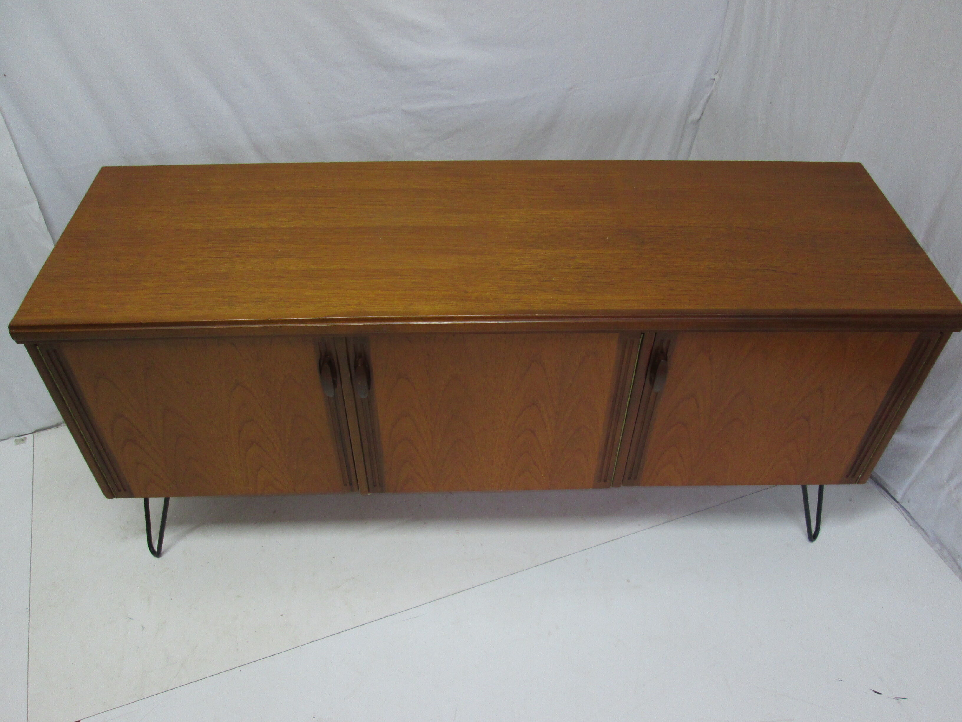 Vintage teak line pins feet