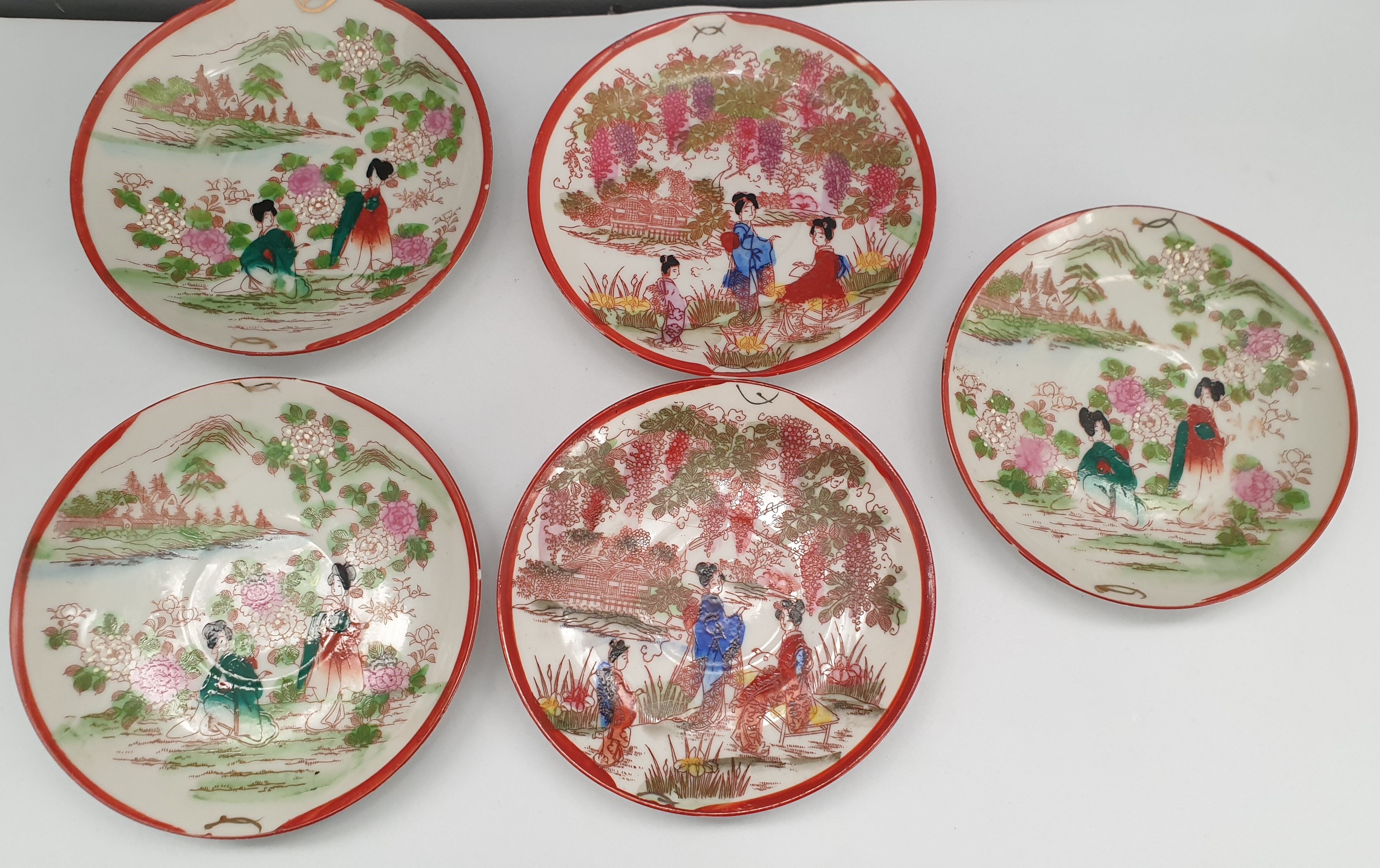 Set of seven tea cups and five sub-cups made of Japanese porcelain