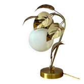 Vintage lamp with brass leaves and matte opaline globe.