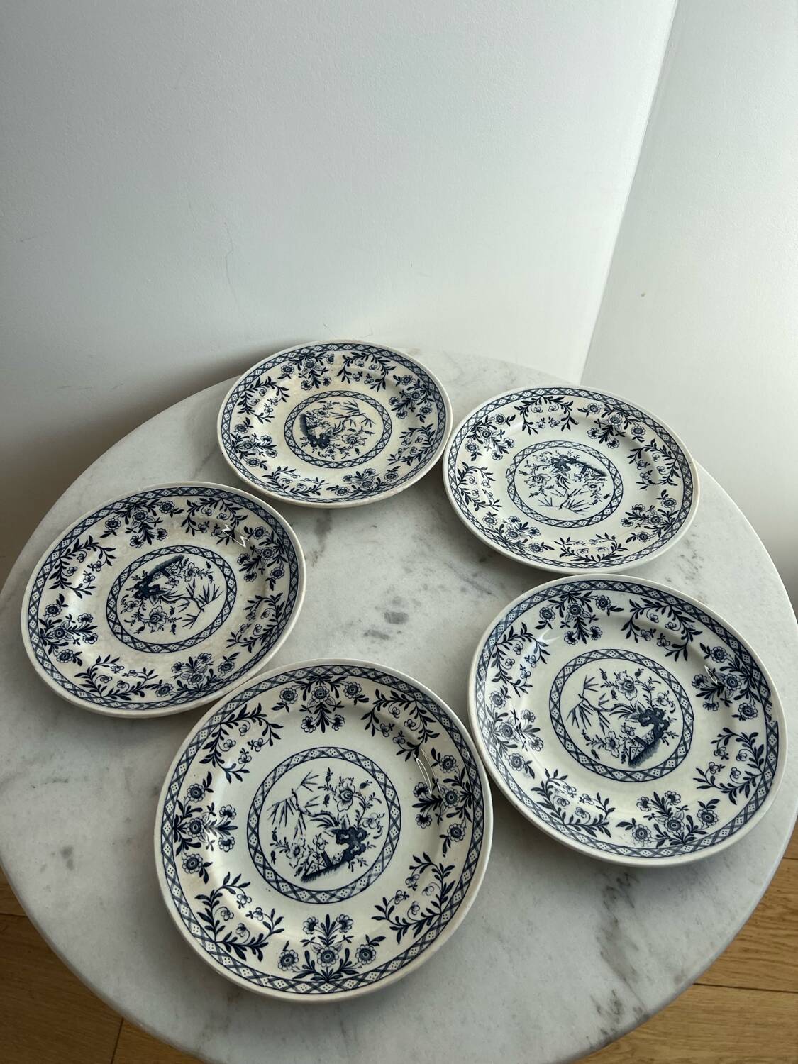 Set of five Lunéville KG Delet dessert plates.