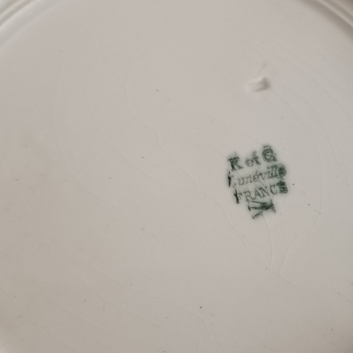 Set of five Longwy iron earth plates