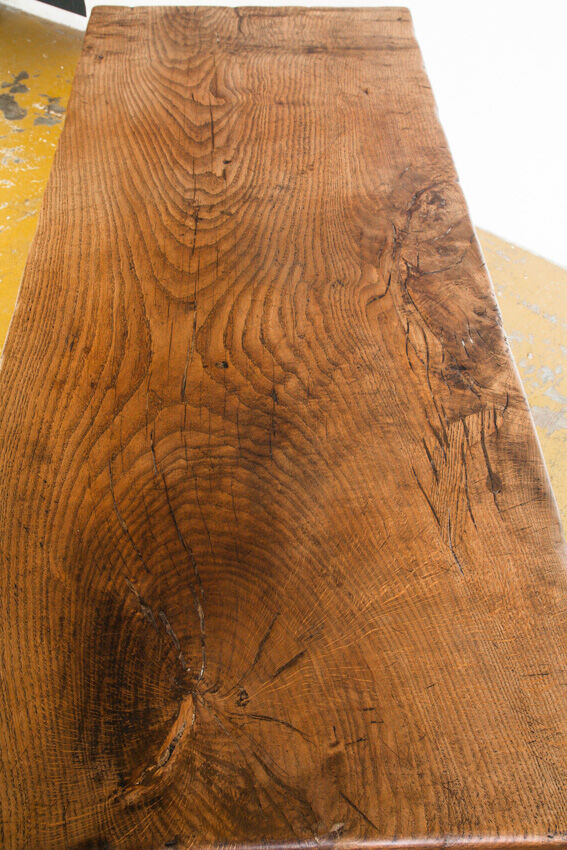 Old coffee table in solid oak wood. France, early twentieth century.