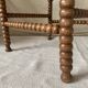 Corner chair in straw and turned wood, fireside chair.