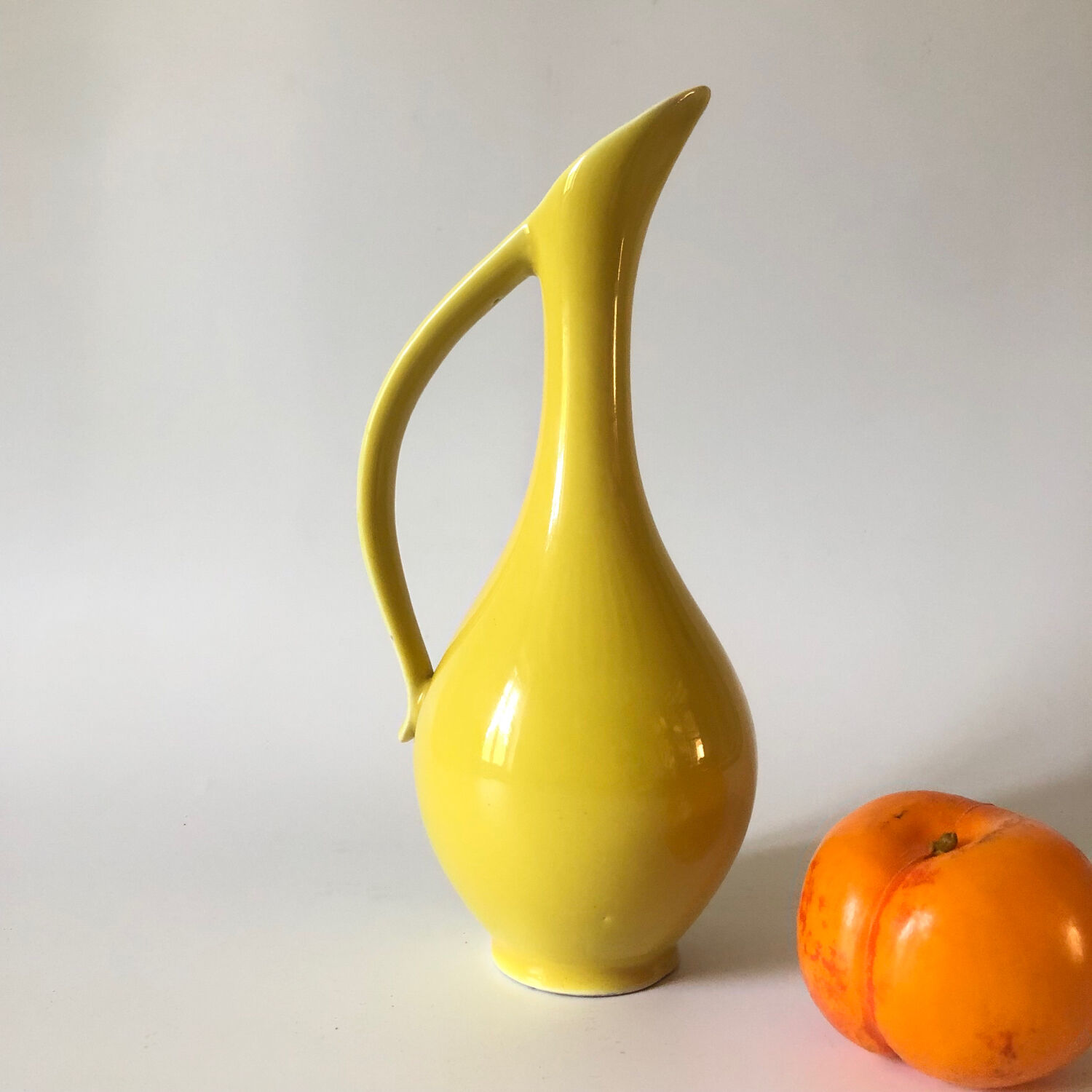 Vintage yellow ceramic decanter