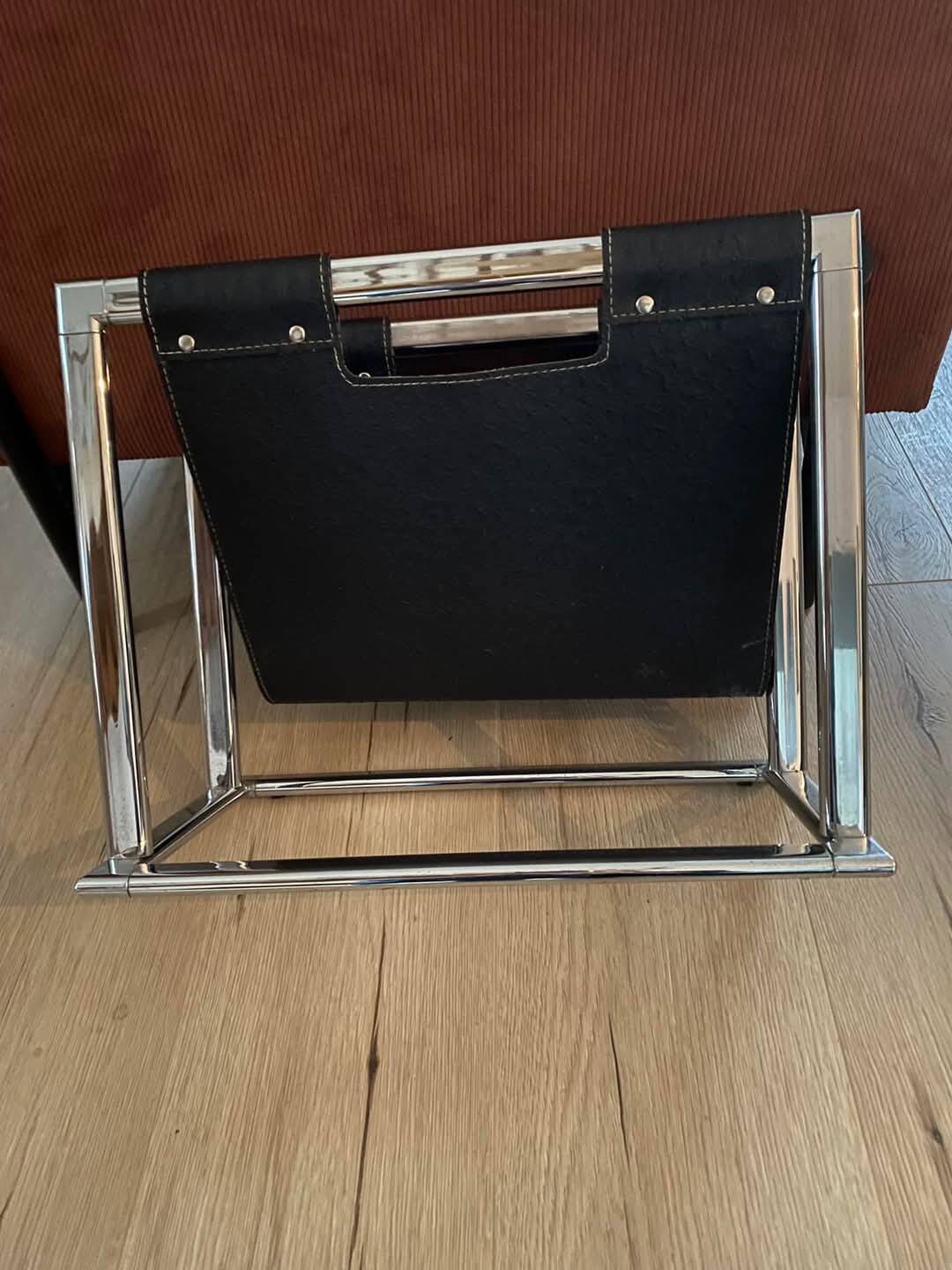 Chrome metal and leather magazine rack
