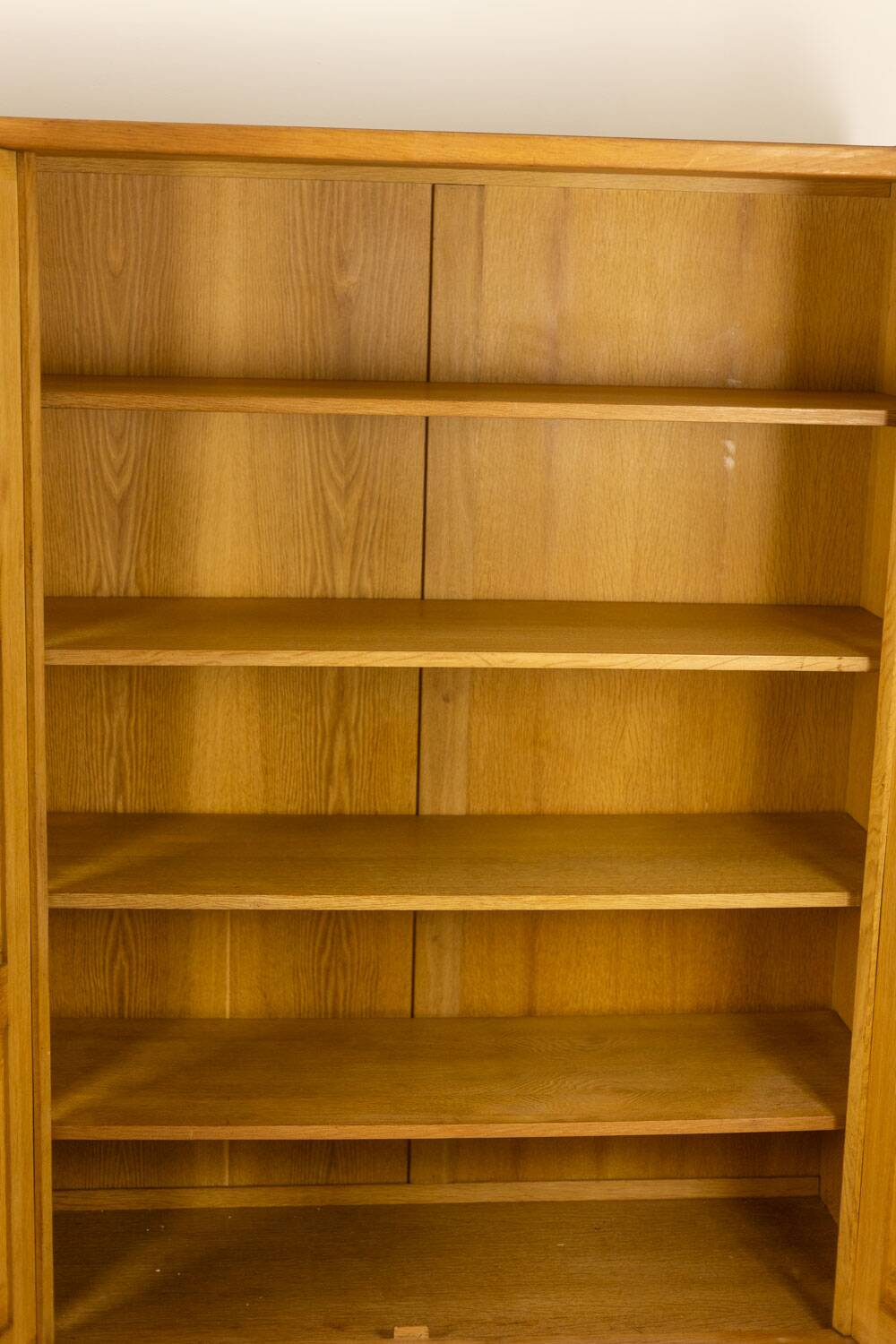 Guillerme and Chambron. Oak wardrobe with integrated secretary. 1970-80.
