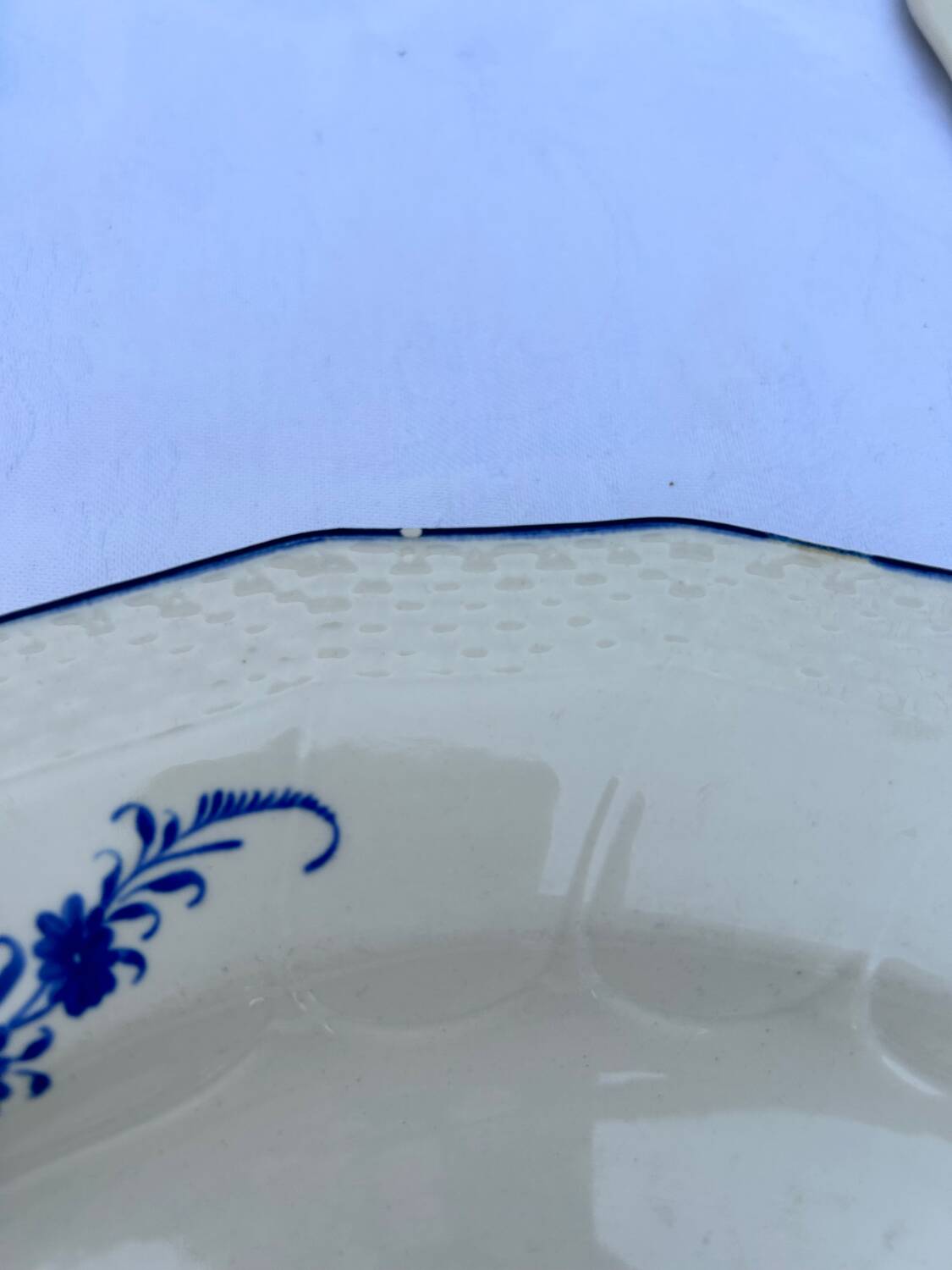 Set of 4 Bleu de Tournay iron earth plates