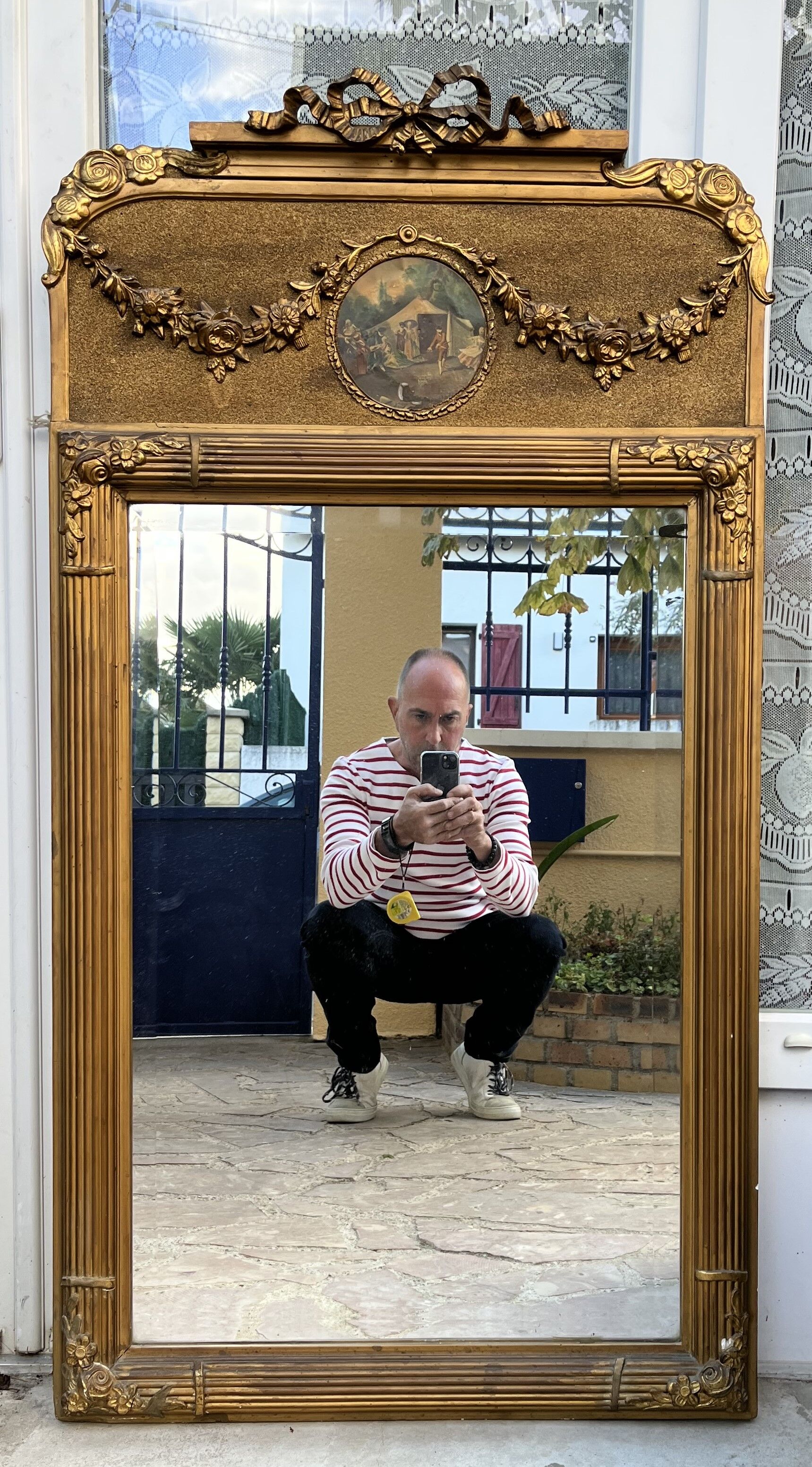 Miroir ancien en bois doré 128 x 68 cm
