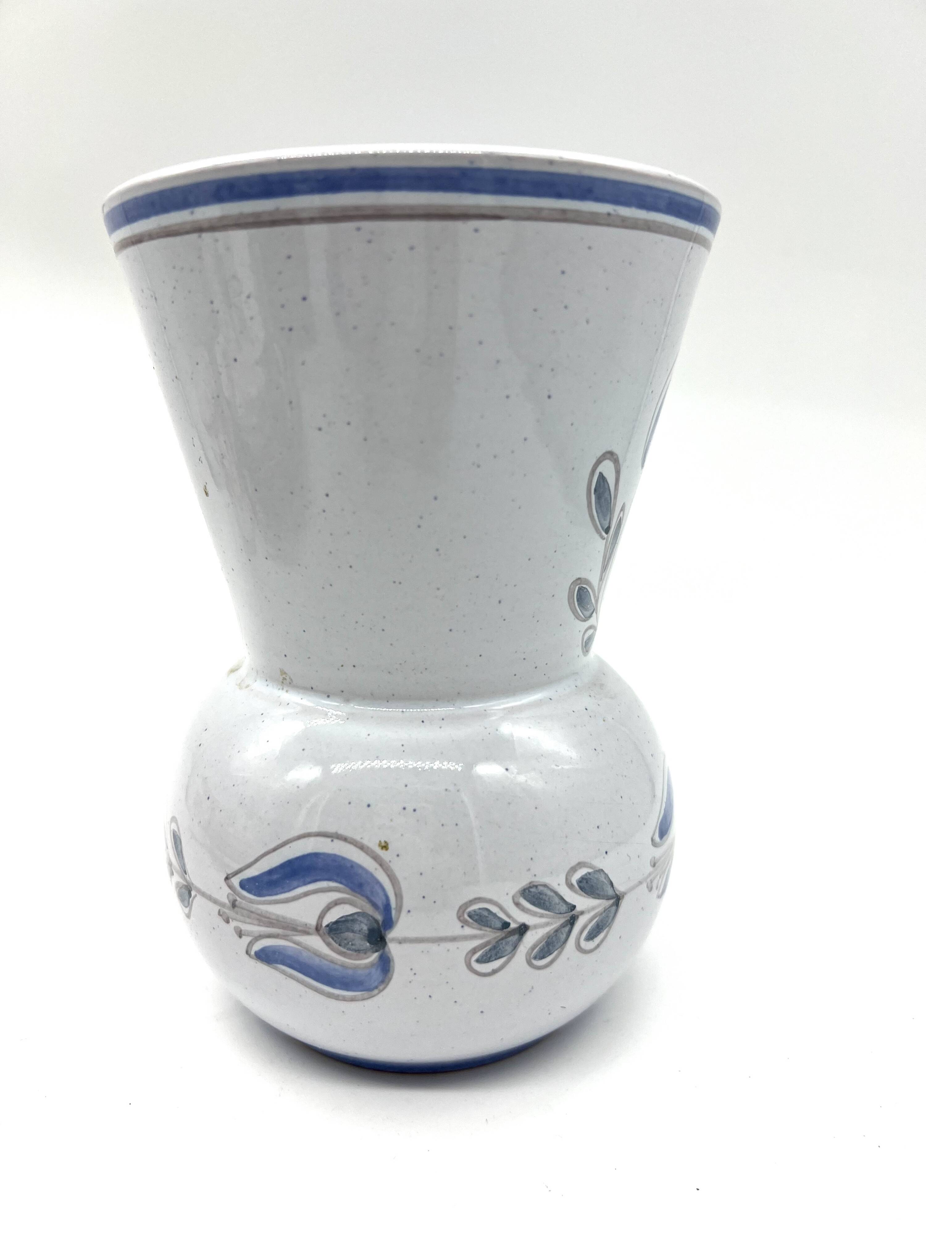 Blue glazed earthenware vase – stylized floral decoration – signed on the base