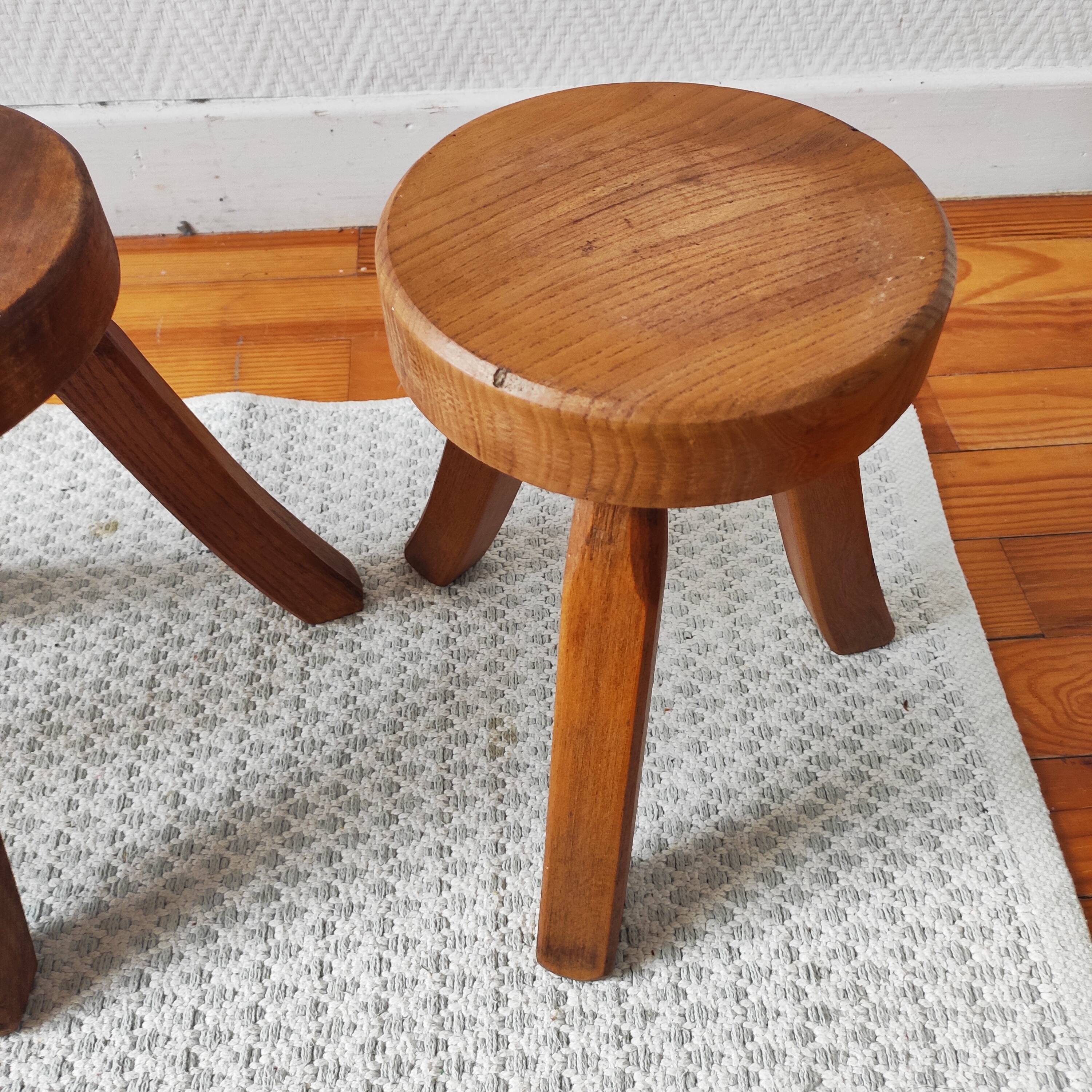 3 wooden tripod stools