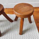 3 wooden tripod stools