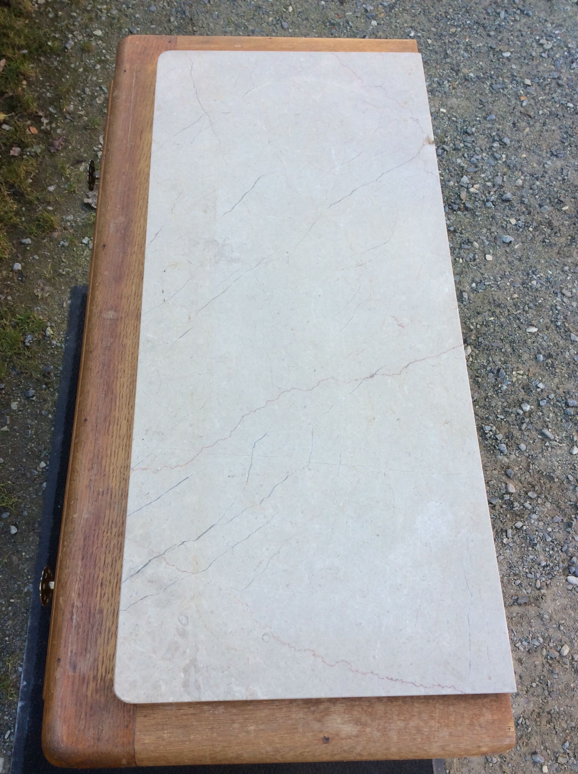 Vintage chest of drawers with oak compass base with marble top.