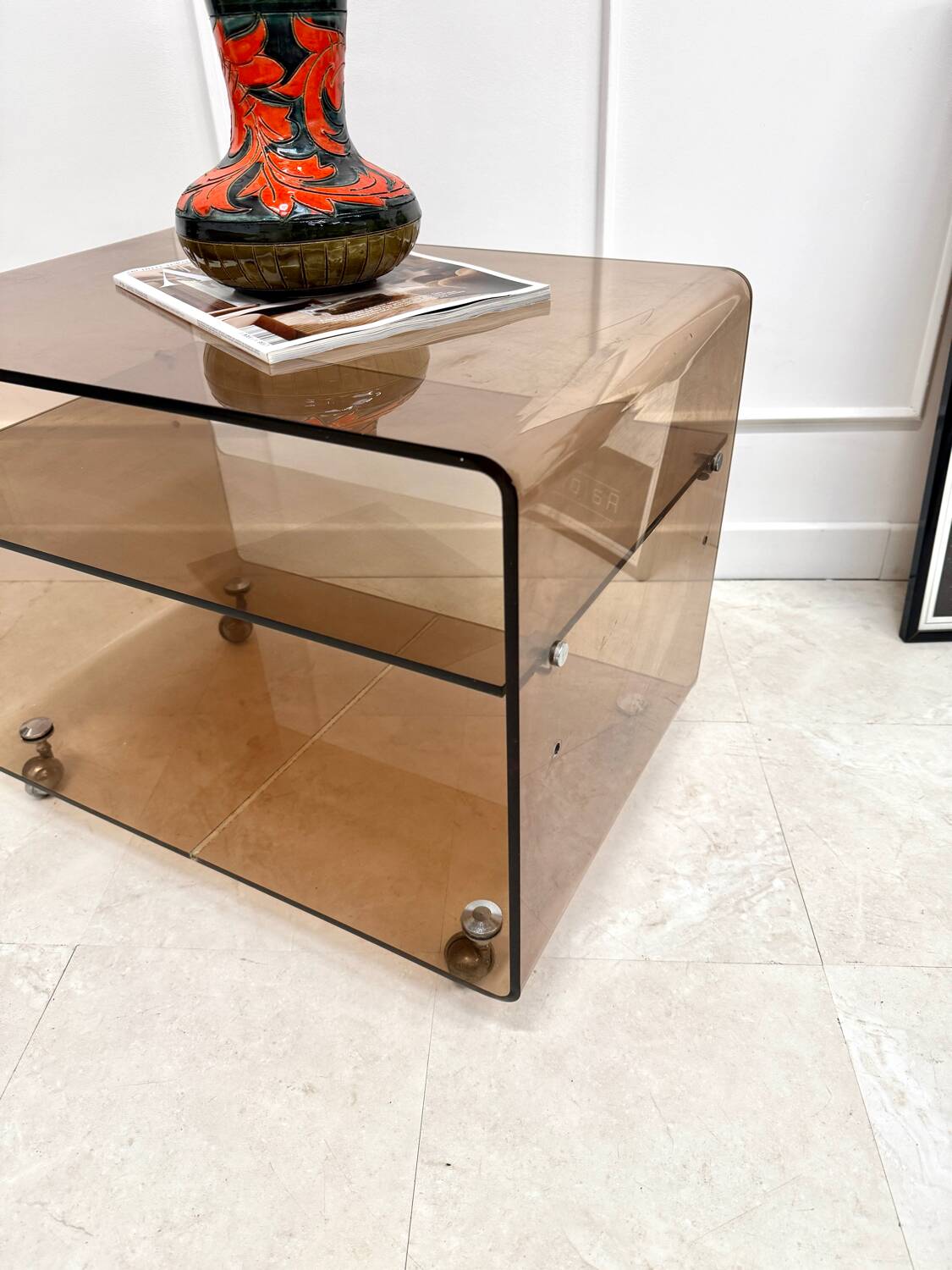 Smoked plexiglass coffee table