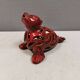 Beautiful seal in ceramic with metallic red glaze.
