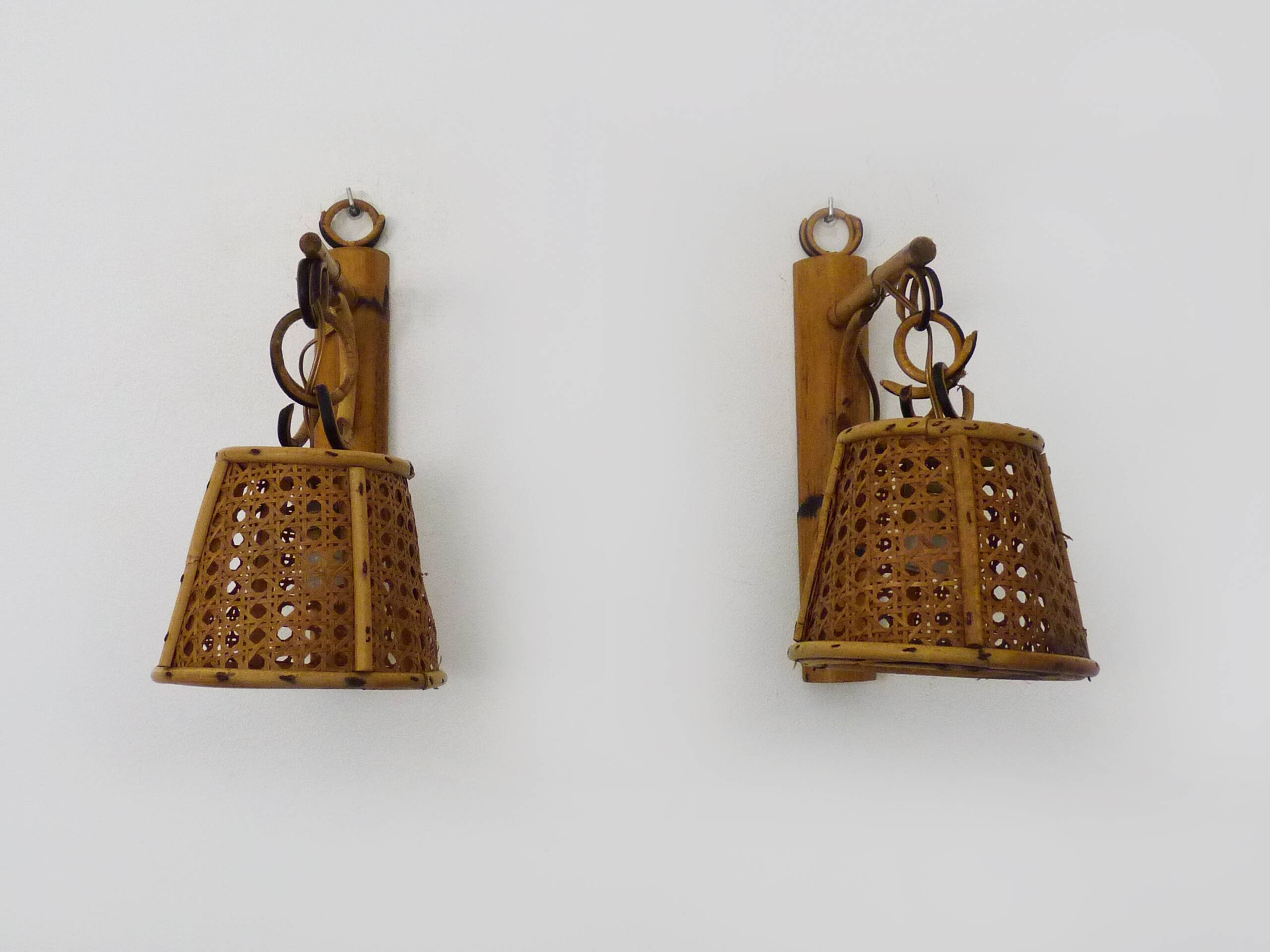 Pair of rattan and cane lantern wall lights. 1950s-1960s