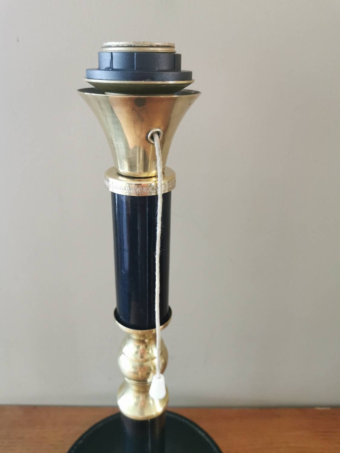 Vintage lamp base in black leather and brass