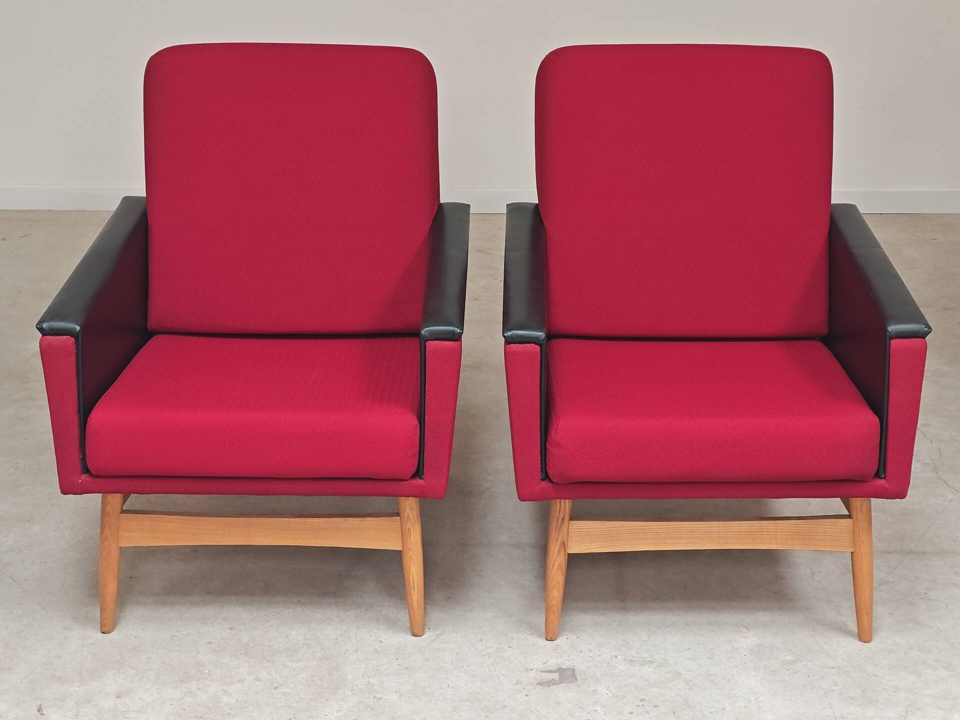 Pair of Drevotex Zamberk armchairs, red fabric and faux leather 1970