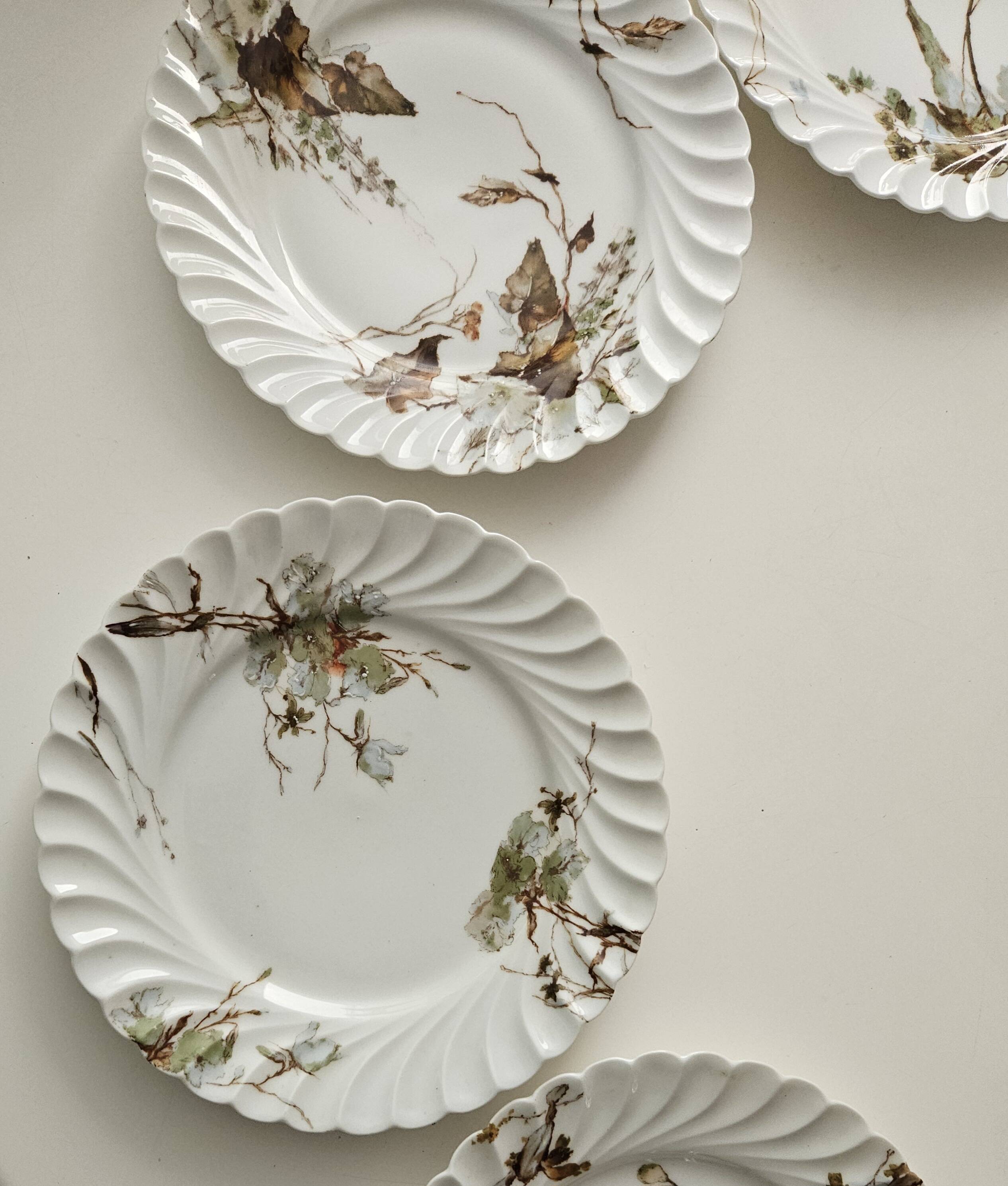 Haviland service plates, dishes on pedestals and soup tureen