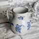 Antique Saint-Uze steel clay pitcher with cobalt blue floral pattern