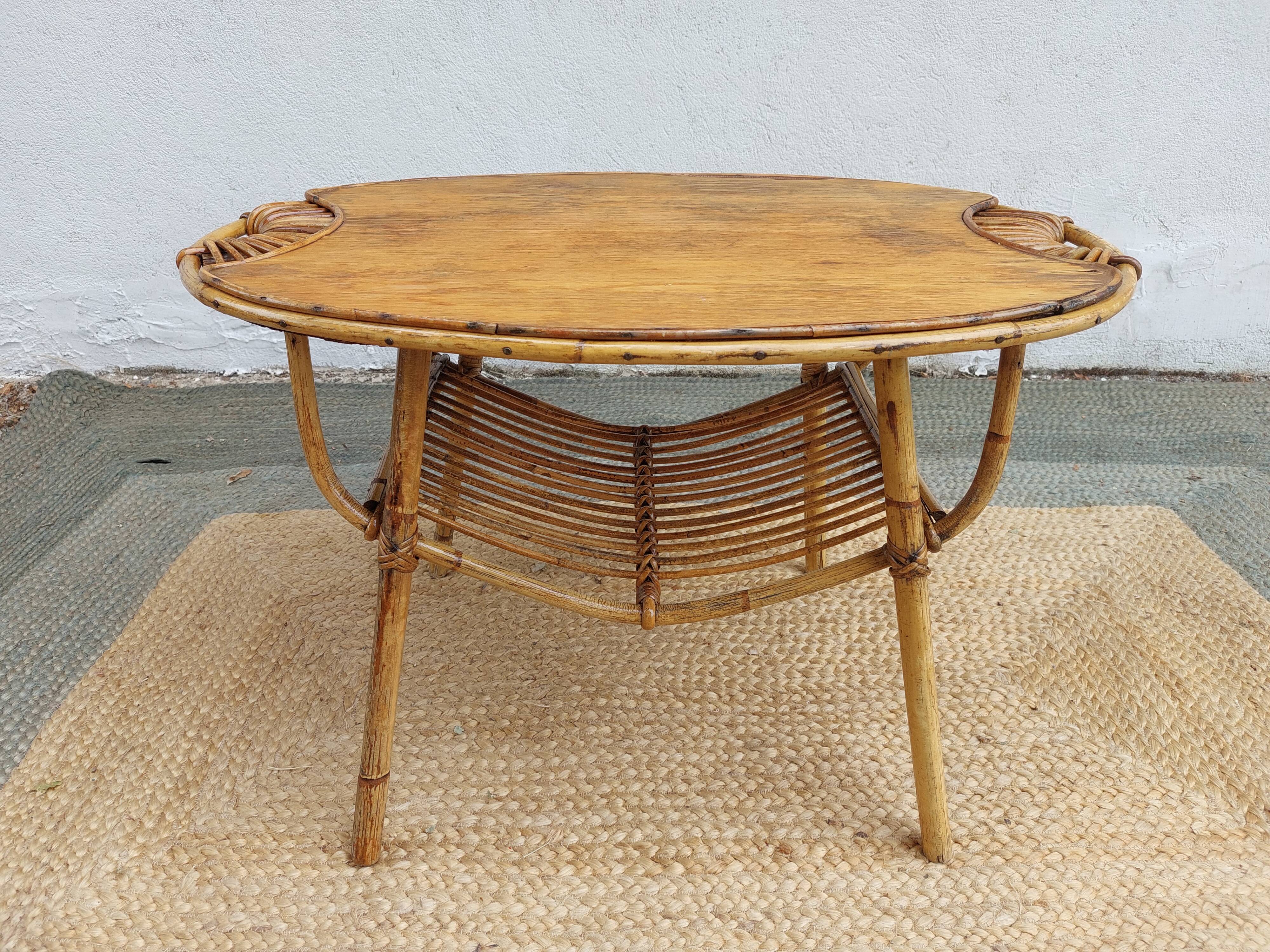 4 armchairs and a coffee table made of rattan and bamboo wood, vintage.