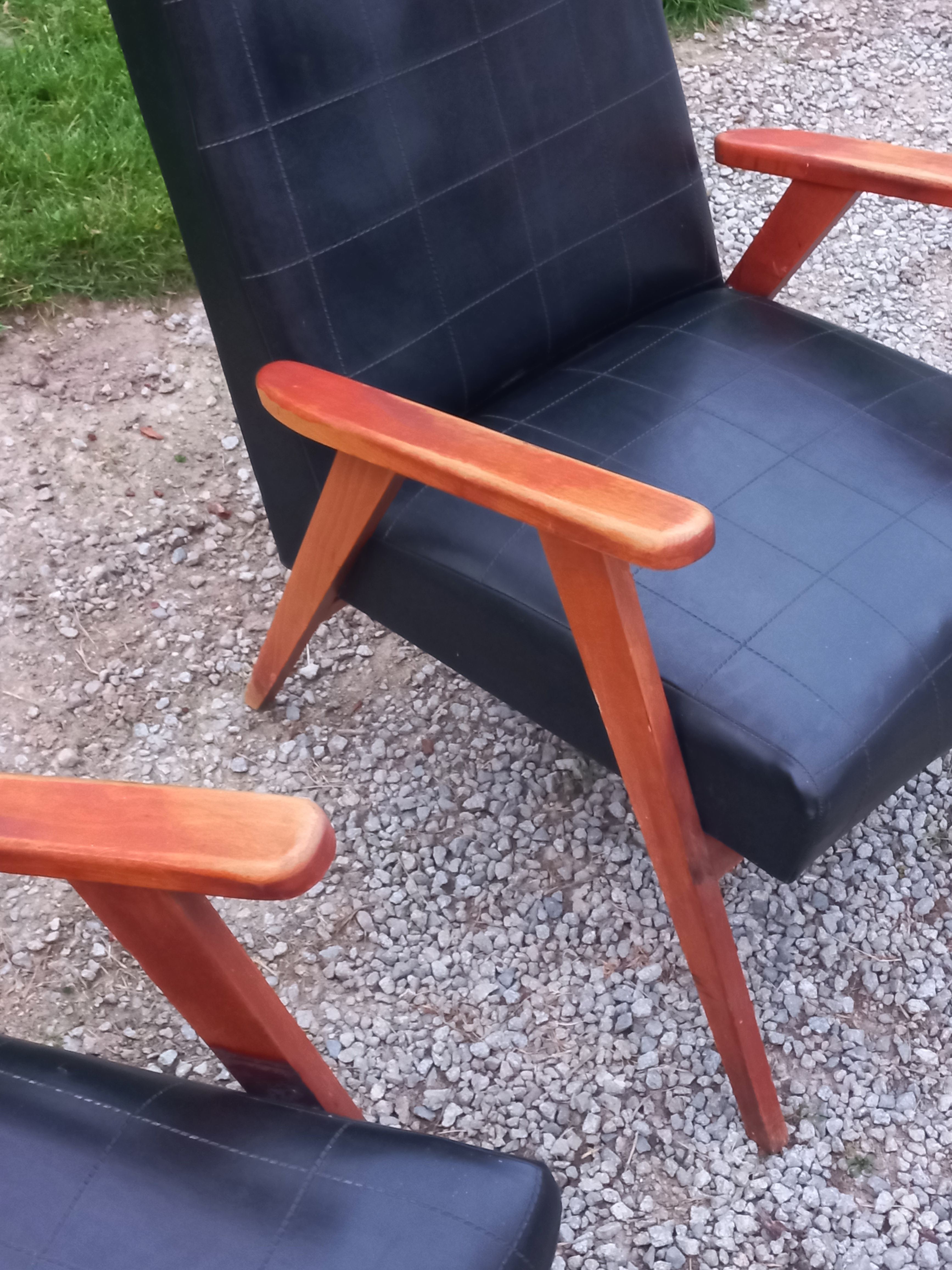Pair of vintage beech armchairs feet compass covered with black moleskine from the 50s