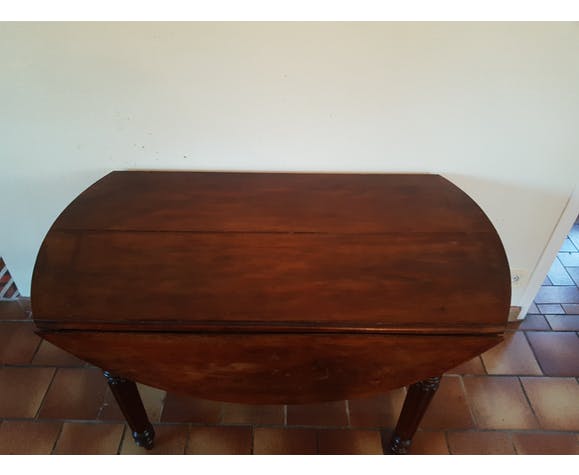 Old round table with flaps