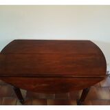 Old round table with flaps