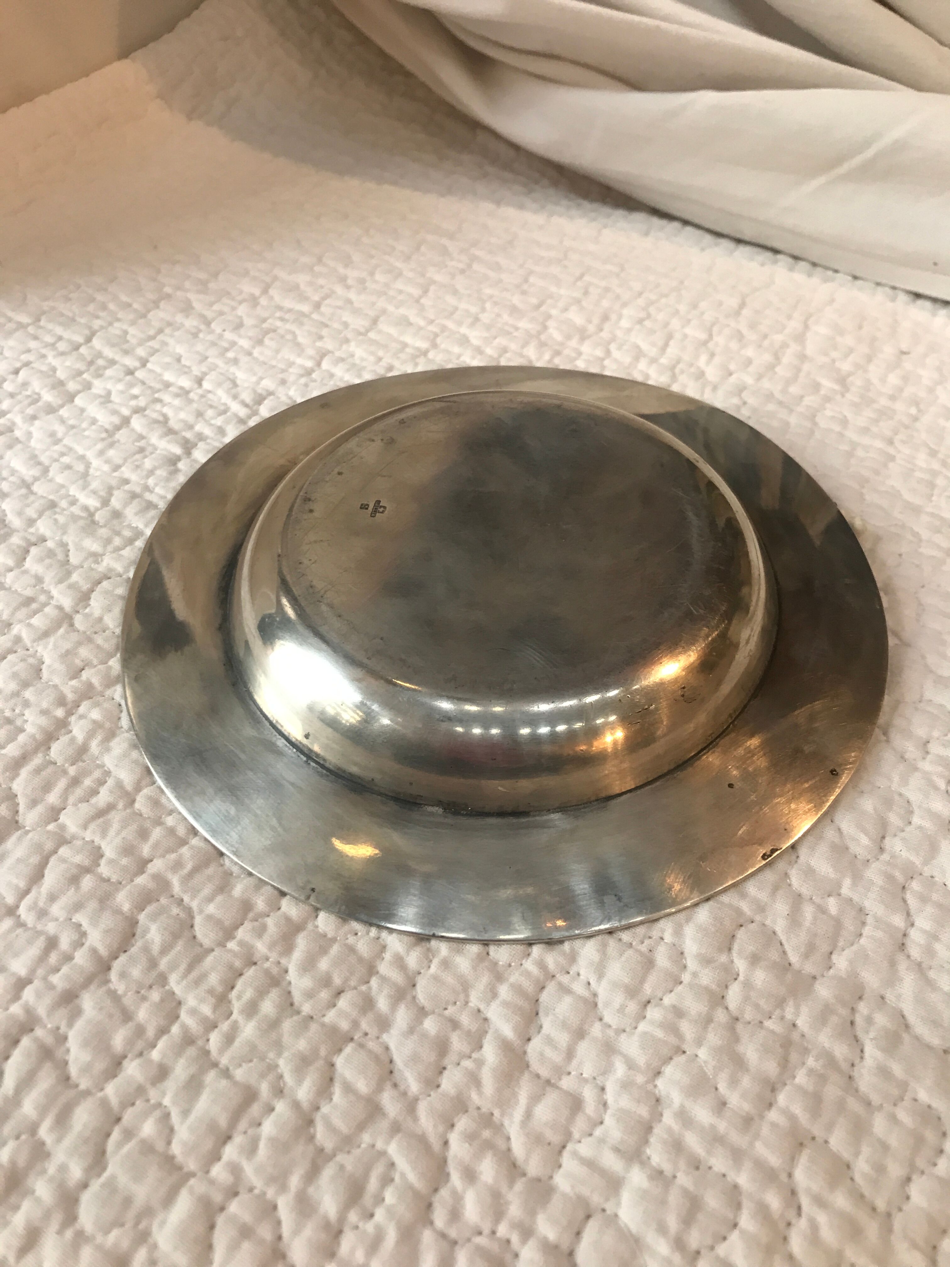 Empty pocket in silver metal Gallia