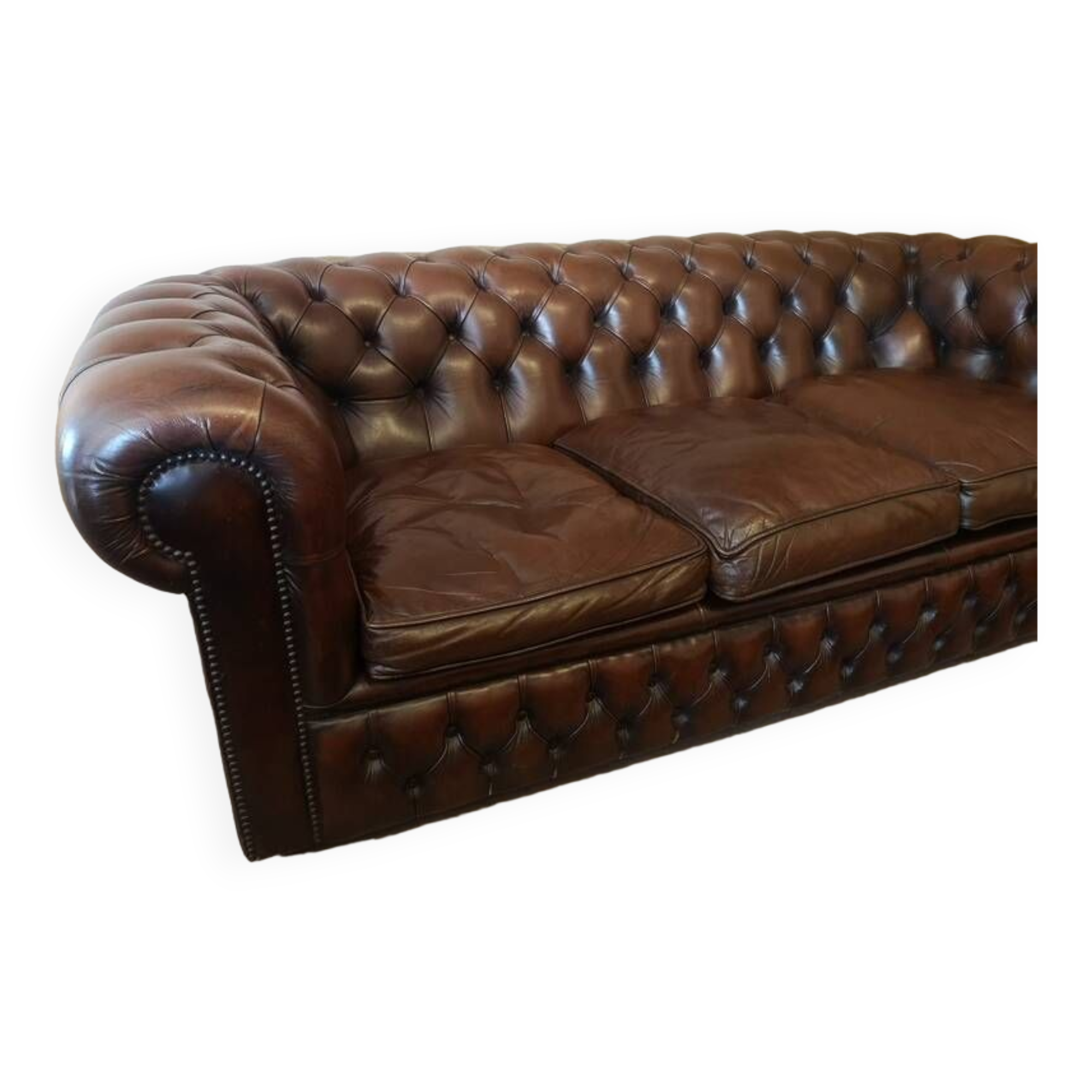 Vintage three-seater brown leather Chesterfield sofa