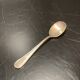 Egg cup with silver metal spoon