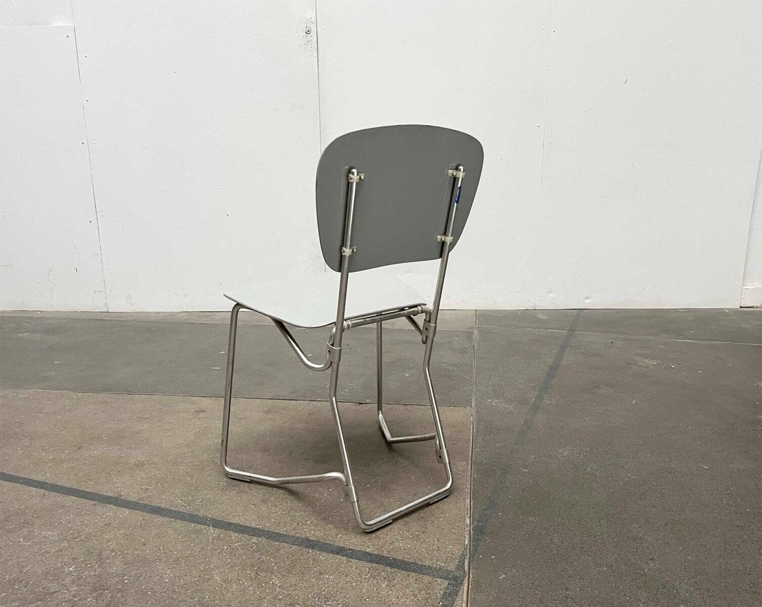Stackable folding chair in space age style from the mid-century by Armin Wirth for Aluflex, 1960s, set of 3.