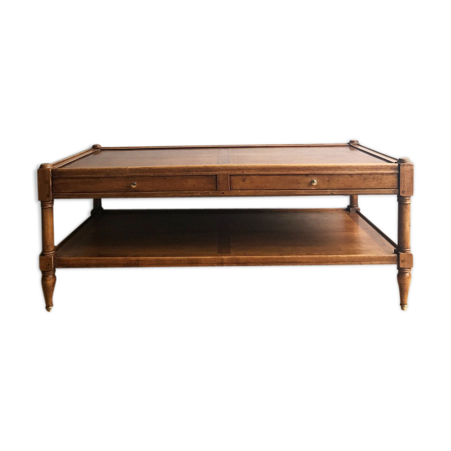 A solid wood-marked coffee table.