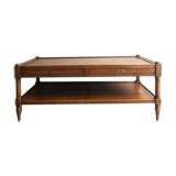 A solid wood-marked coffee table.