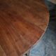 Antique round dining table in cherry wood, France, circa 1920.