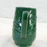 Pichet vert vintage en faience de St clement decor de panier fleuri
