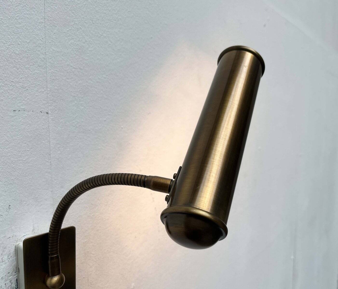 Vintage German brass patinated wall lamp with a gooseneck design by Honsel, 1970s.
