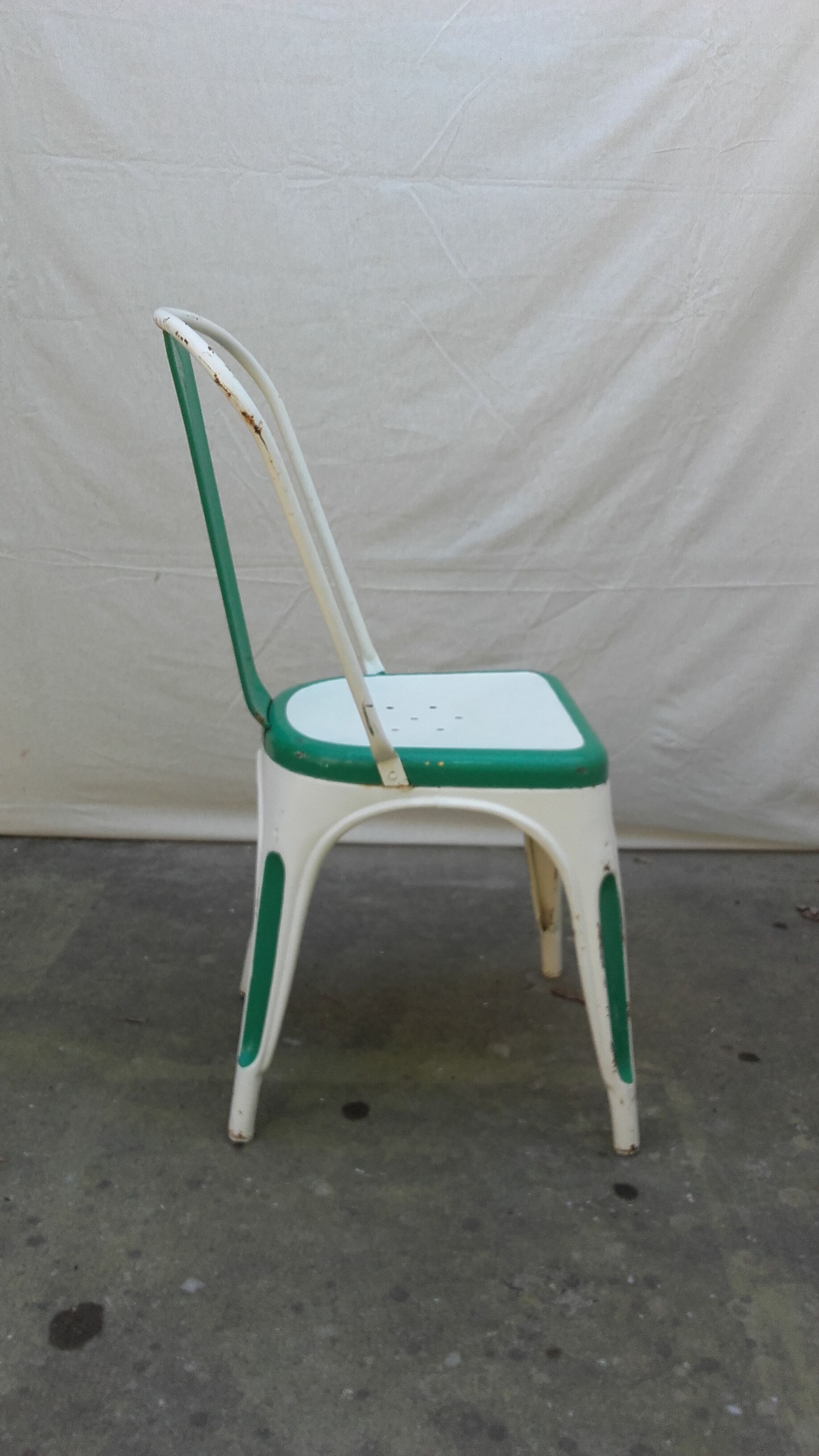 Four old Tolix Model A chairs