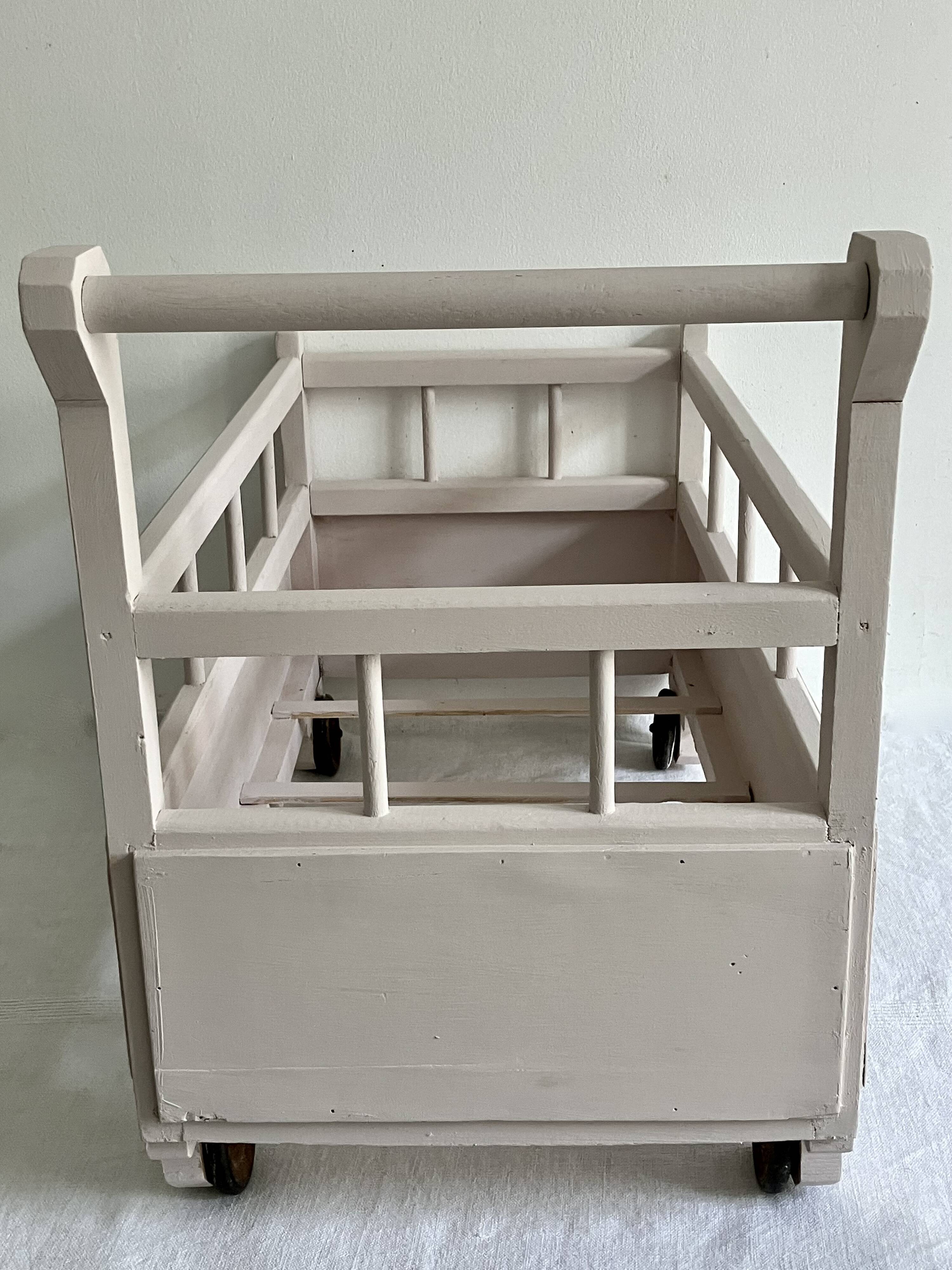 Old toy, doll's bed, caravan bed