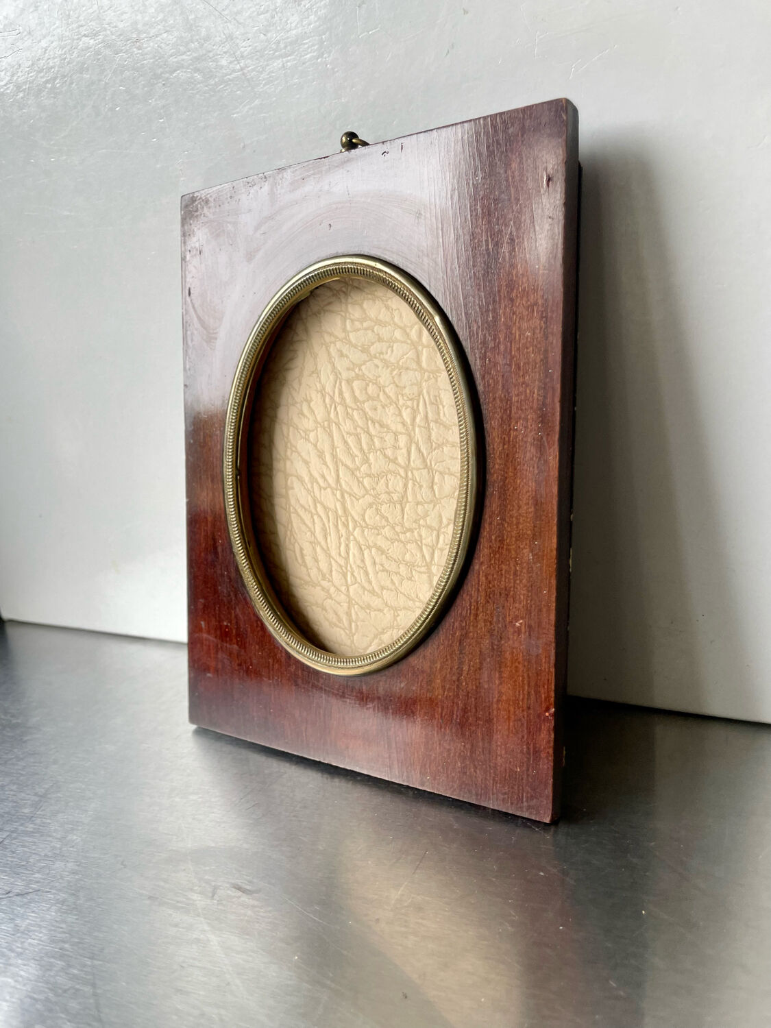 Mahogany wood frame with brass borders