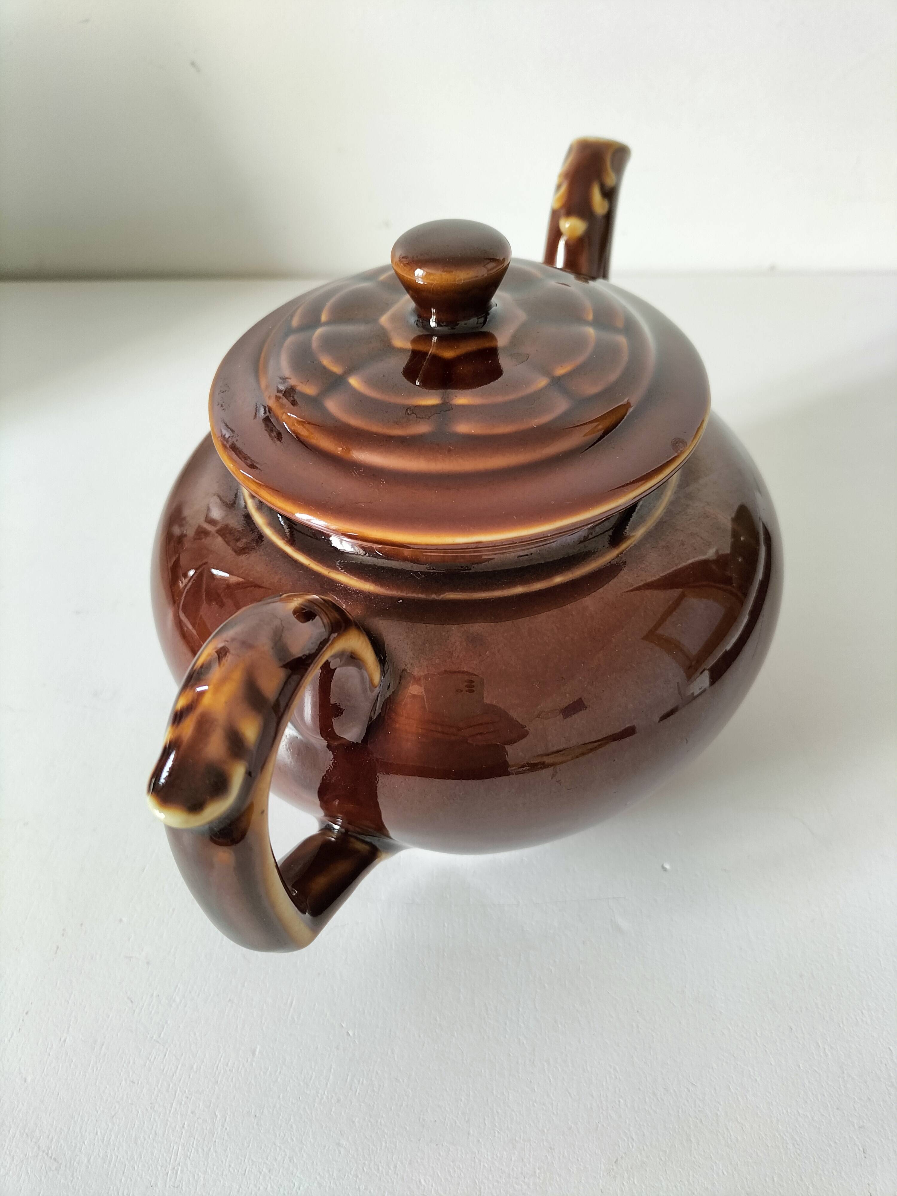 Vintage brown glazed earthenware teapot, mid-century sculptural decor.