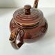 Vintage brown glazed earthenware teapot, mid-century sculptural decor.