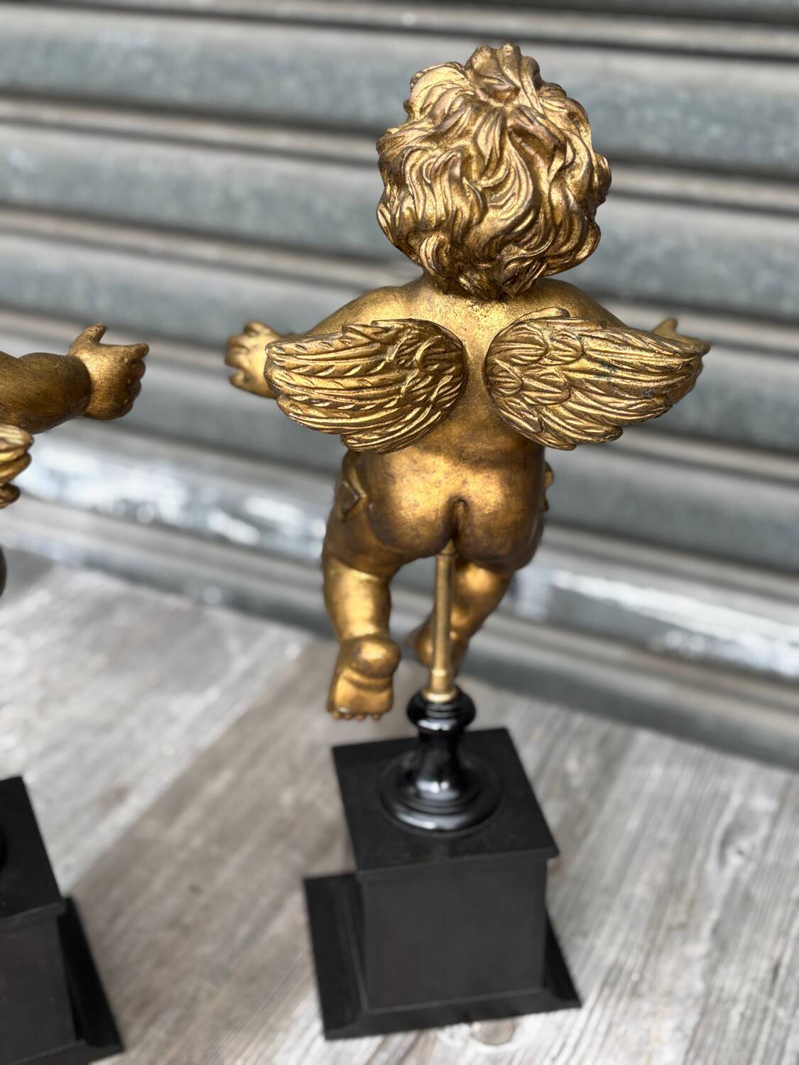 Pair of gilded cherubs on a Napoléon III base