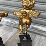 Pair of gilded cherubs on a Napoléon III base