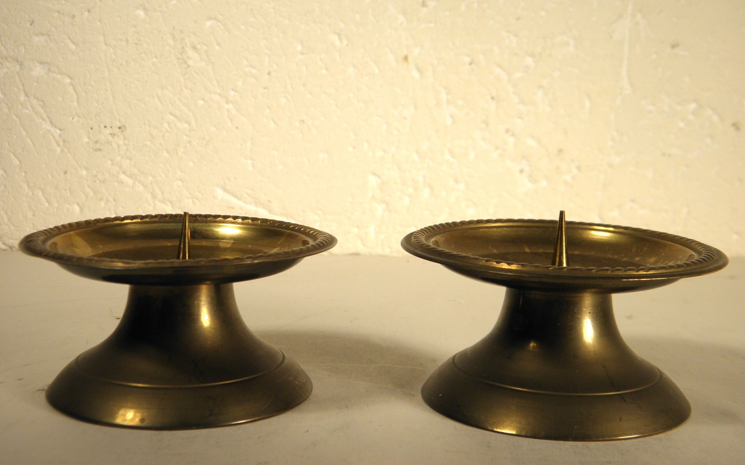 Pair of brass "pique - candle" candlesticks