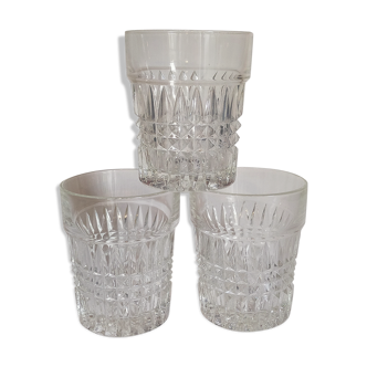 Trio of vintage whiskey glasses in pimpled glass