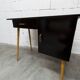 Baumann desk and chair, 1960s, Formica, wood and black, green seat
