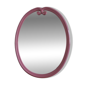 Oval mirror with pink enamel frame